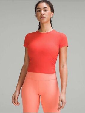 Lululemon All It Takes Short Sleeve Shirt Nulu in Solar Orange, size 6